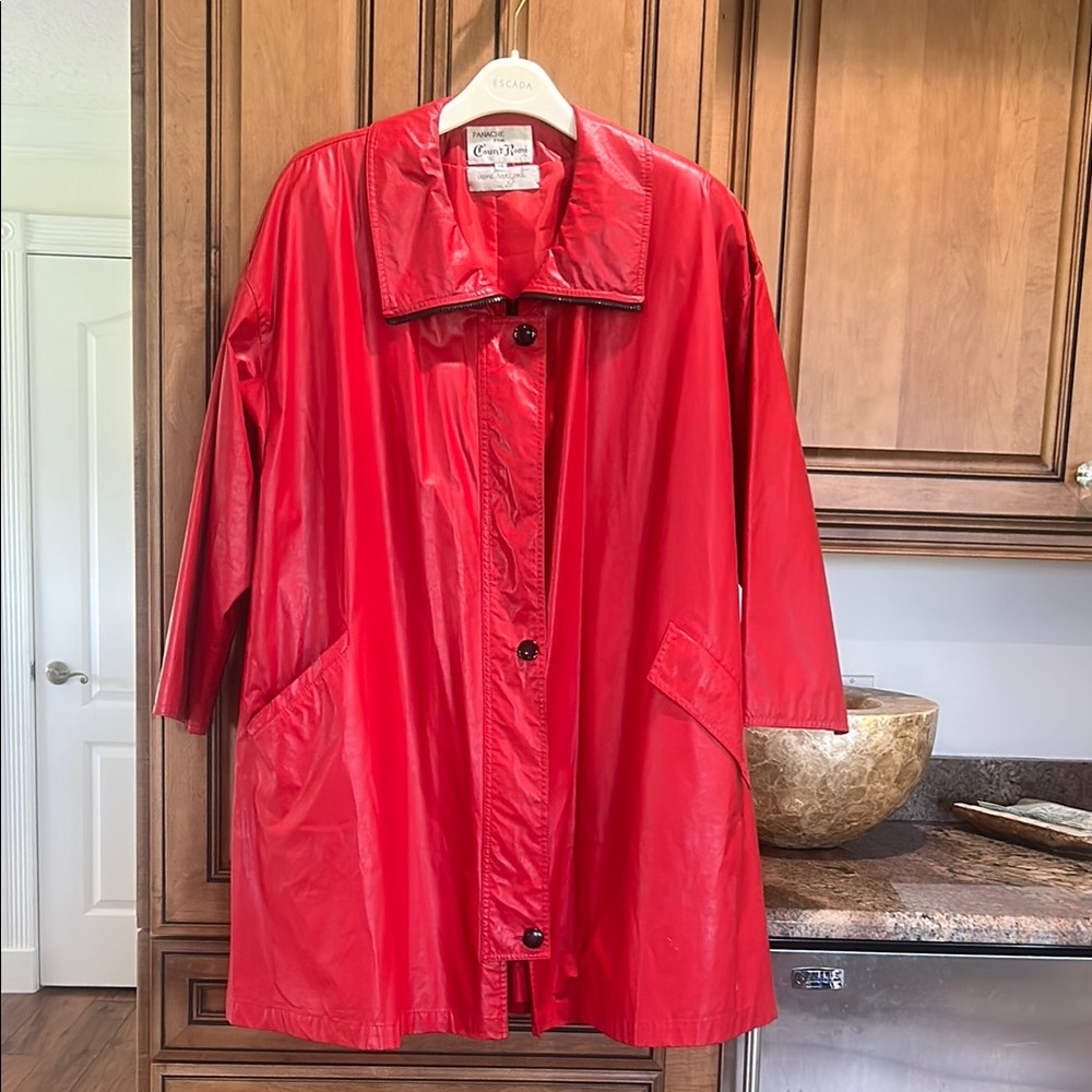 Women's Red rain Jacket. Size 14.